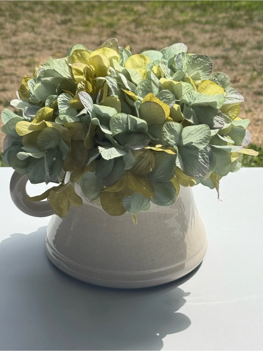 Cream glossy crackled style pot with artificial plants decor